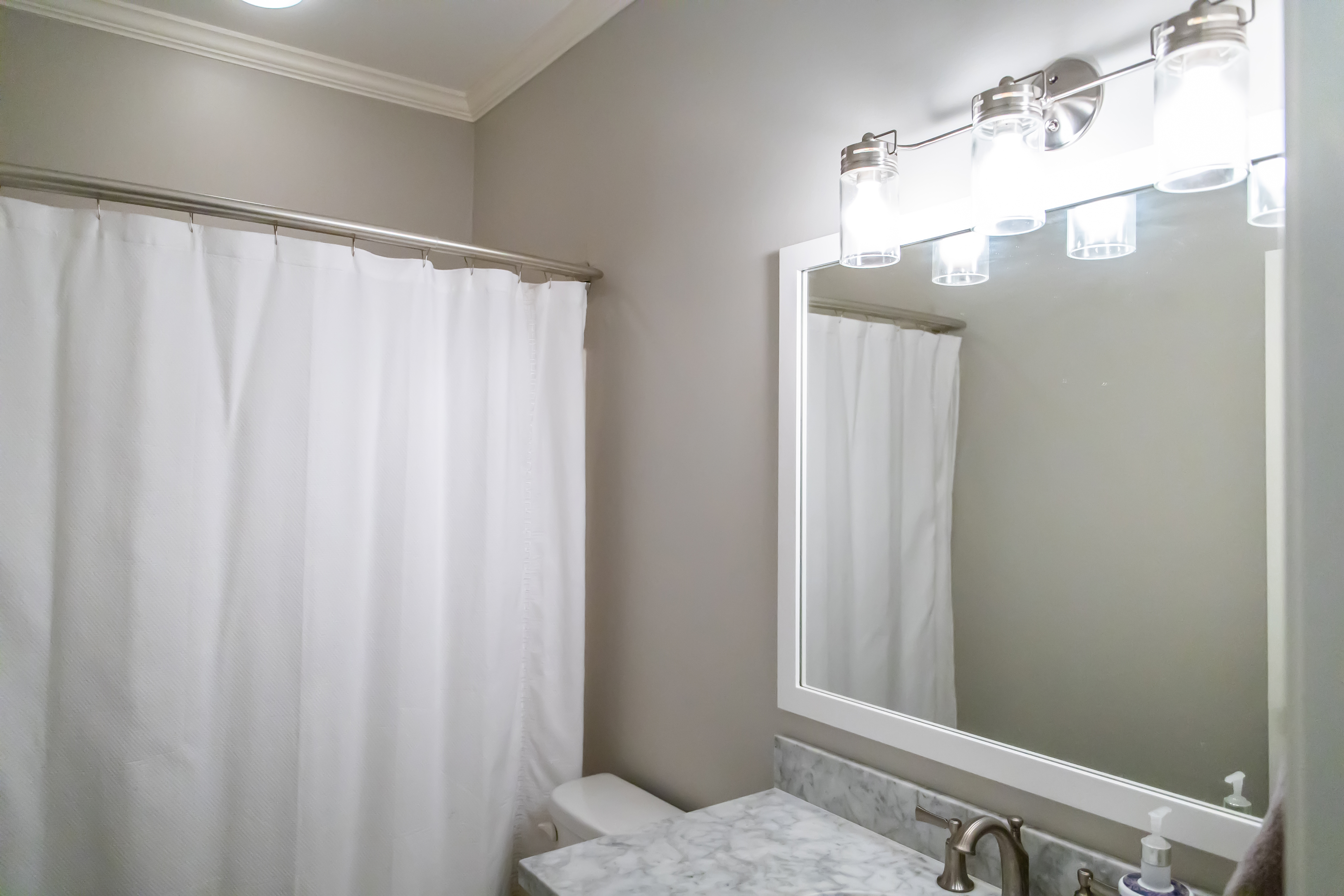 Small Bathroom Decorating Ideas - White Shower Curtain