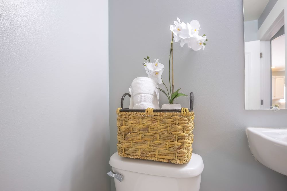 Storage Ideas For A Small Bathroom - Basket Of Toilet Paper