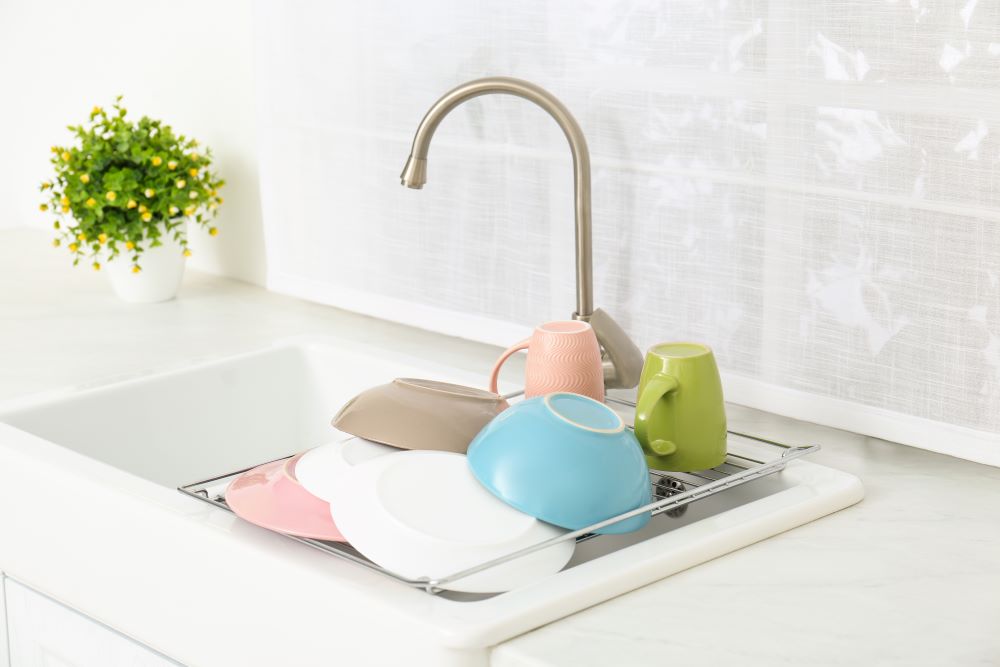 Use An In Sink Dish Drying Rack To Clear Up Countertop Space