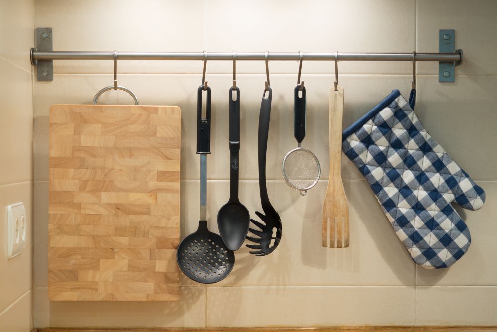 How To Declutter Your Kitchen Counters - Hang Kitchen Utensils On The Wall
